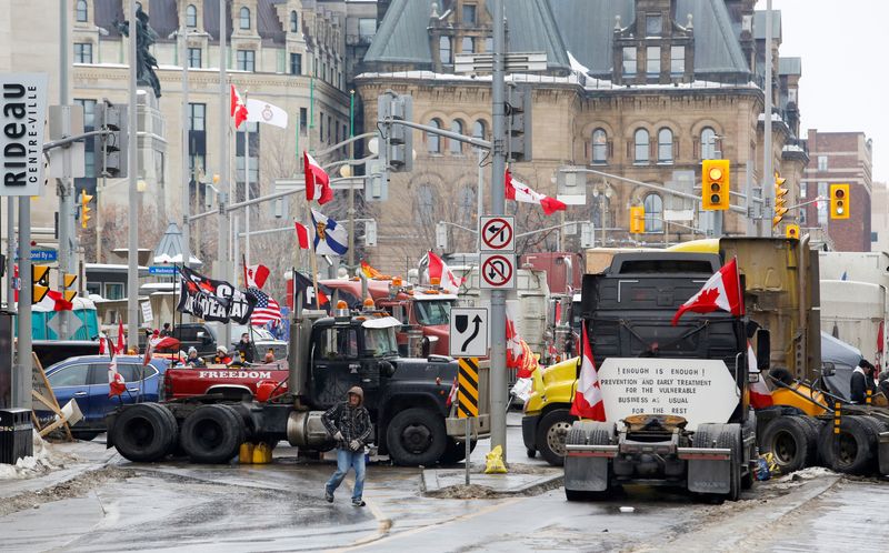 Trucks block downtown streets as truckers and their supporters continue to protest against the COVID-19 vaccine mandates, in Ottawa, Ontario, Canada, on Thursday.