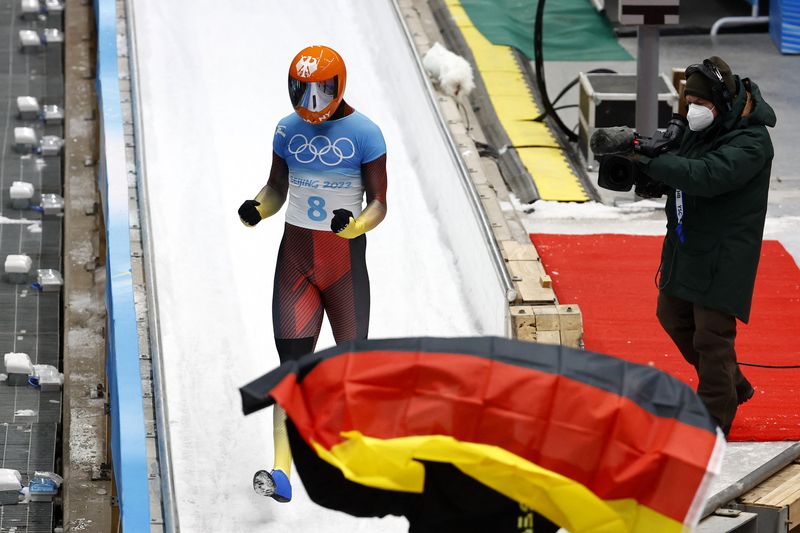 2022 Beijing Olympics - Skeleton - Men Heat 4 - National Sliding Centre, Beijing, China - February 11, 2022. Christopher Grotheer of Germany reacts after winning gold.