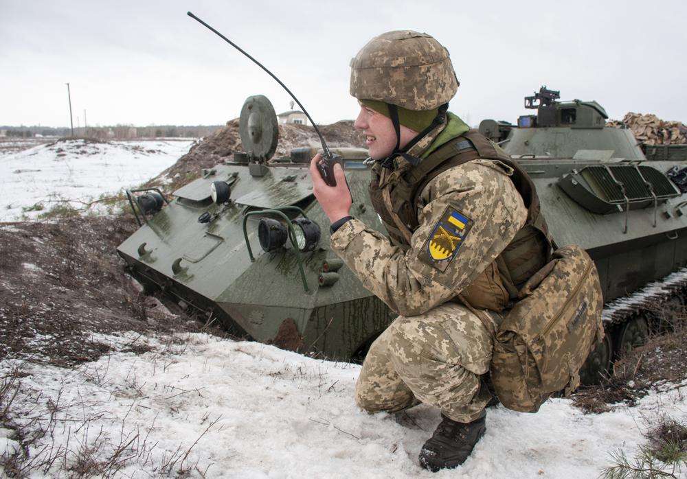 A Ukrainian soldier trains during military drills close to Kharkiv, Ukraine, Thursday.