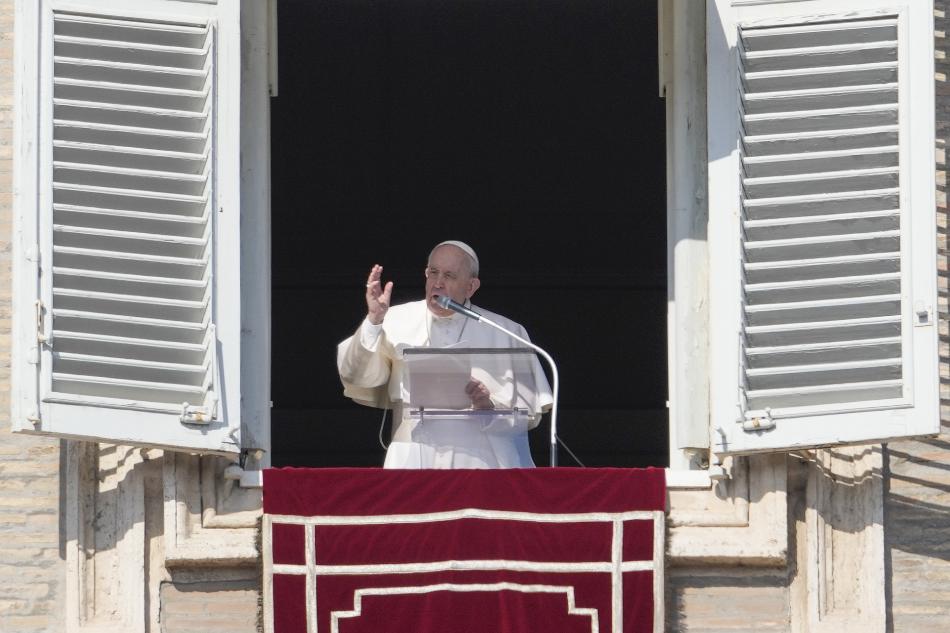 Pope Francis delivers the Angelus noon prayer from his studio window overlooking St. Peter's Square at the Vatican, Sunday, Feb. 6, 2022. Although some Americans have been seeking religious exemptions in order to circumvent COVID-19 vaccine mandates, Francis has defended the vaccines as “the most reasonable solution to the pandemic.” 