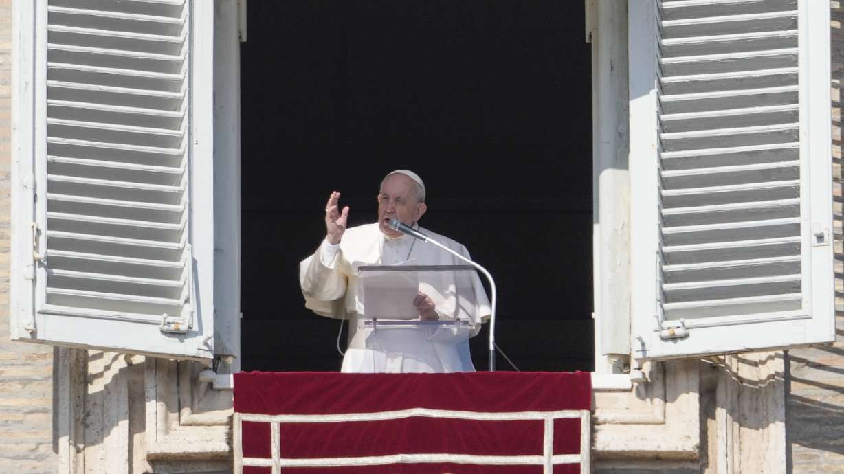Pope Francis delivers the Angelus noon prayer from his studio window overlooking St. Peter's Square at the Vatican, Sunday, Feb. 6, 2022. Although some Americans have been seeking religious exemptions in order to circumvent COVID-19 vaccine mandates, Francis has defended the vaccines as “the most reasonable solution to the pandemic.”