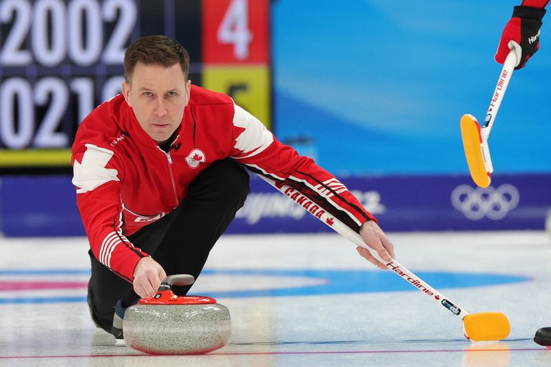 2022 Beijing Olympics - Curling - Men's Round Robin Session 5 - Canada v Sweden - National Aquatics Center, Beijing, China - February 12, 2022.  Skip Brad Gushue of Canada in action.