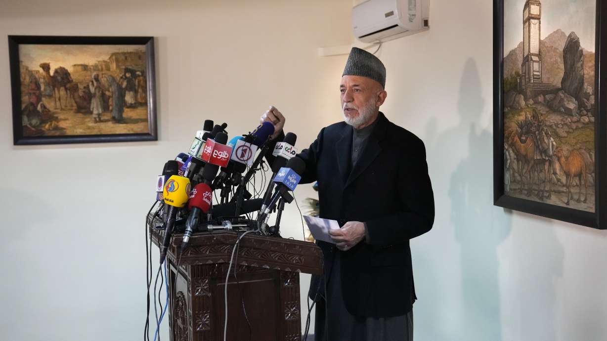 Afghanistan's former President Hamid Karzai, speaks during a press conference, in Kabul, Afghanistan, Sunday. Karzai called a White House order freeing $3.5 billion in Afghan assets for America's 9/11 families "an atrocity against the Afghan people."