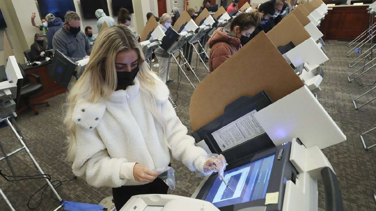 Amy Skalla votes at Draper City Hall in Draper on Tuesday, Nov. 3, 2020. A large majority of Utahns trust that their state will conduct a fair election in 2022 — but they're more split over whether the 2020 election should be audited.
