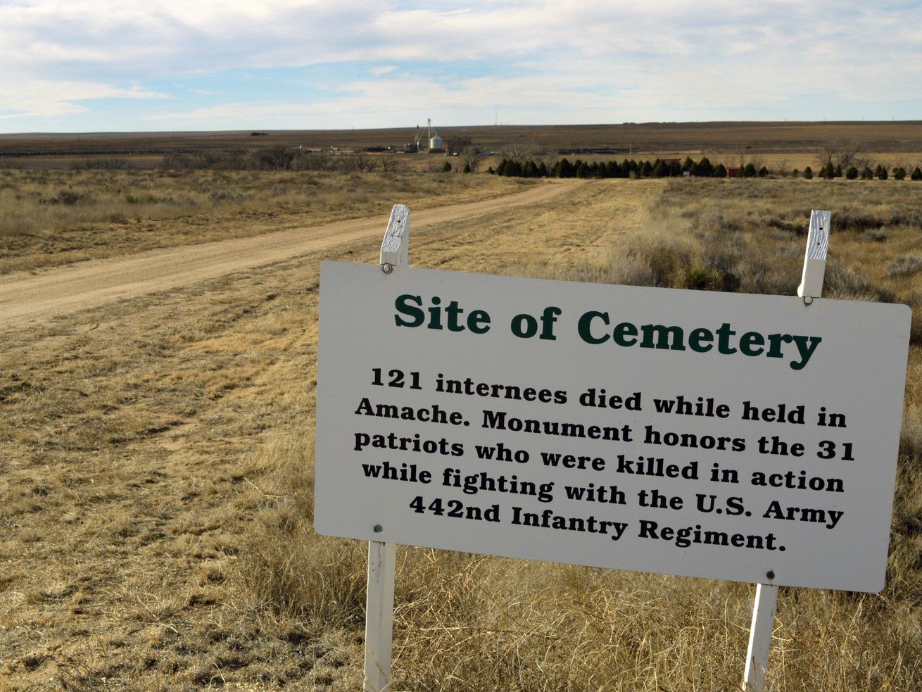 A sign points the way to the cemetery of Camp Amache, on Jan. 18, 2015, the site of a former World War II-era Japanese American internment camp, in Granada, Colo. Sen. Mike Lee of Utah is getting backlash for holding up the creation of a national historic site at the former internment camp in extreme southeast Colorado.