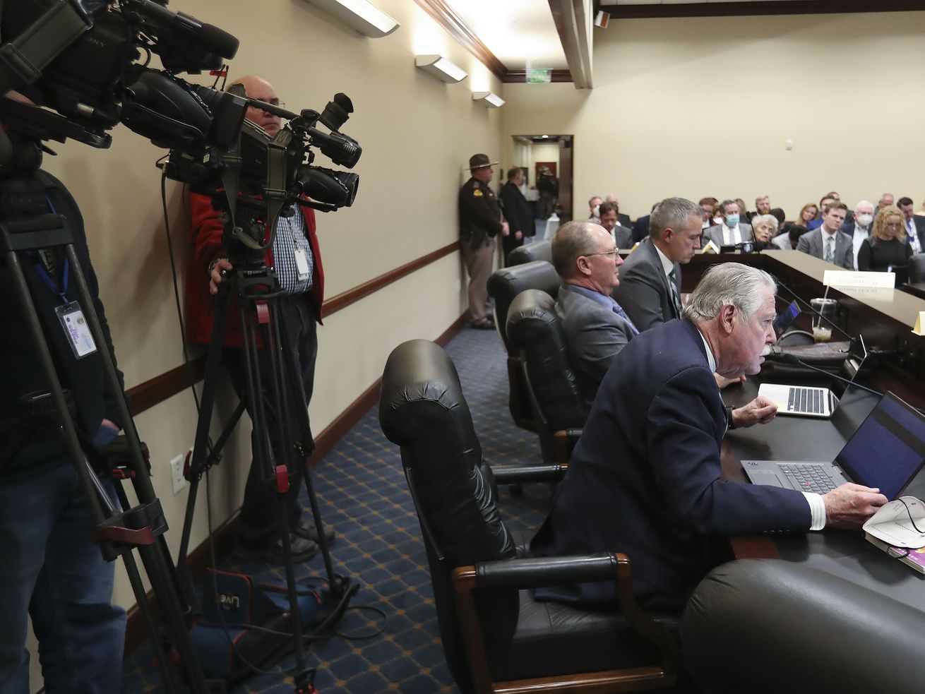 Cameras line the committee room as Sen. Gene Davis, D-Salt Lake City, speaks at the Capitol in Salt Lake City on Feb. 9. In a preliminary vote, the Senate expressed willingness to limit media access to certain areas of the Capitol.