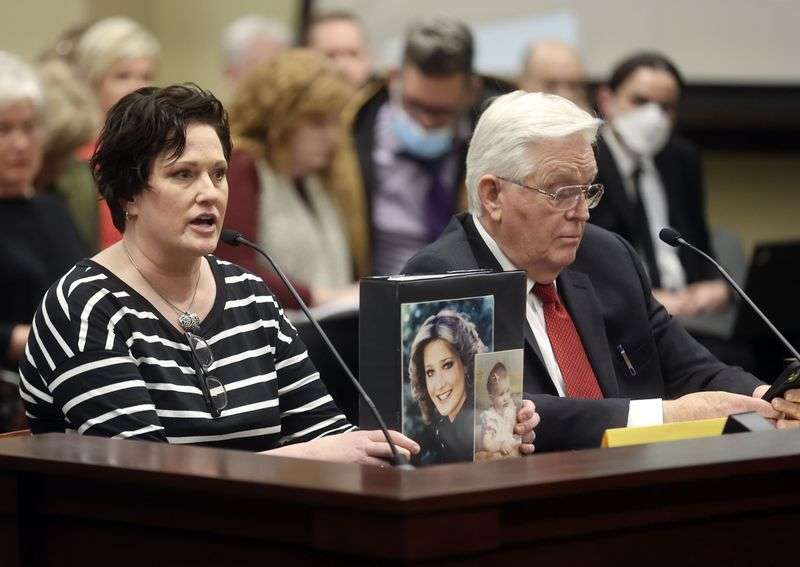 Sharon Weeks gets emotional while speaking in support
of HB0147 Death Penalty Modifications, and talks about her sister
and niece who were murdered in 1984, during a House Law Enforcement
and Criminal Justice Standing Committee in the House Building in
Salt Lake City on Monday.