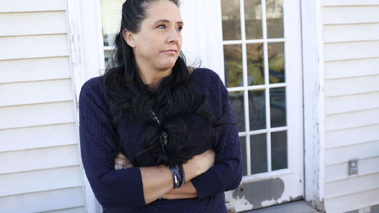 Jennette Pearson, who was assaulted while working as a registered nurse at the Utah State Hospital, listens to her husband talk about her recovery outside her home in Orem on Jan. 31. Pearson is still recovering months later. The newly approved HB32 has enhanced penalties for assaults against health care workers.