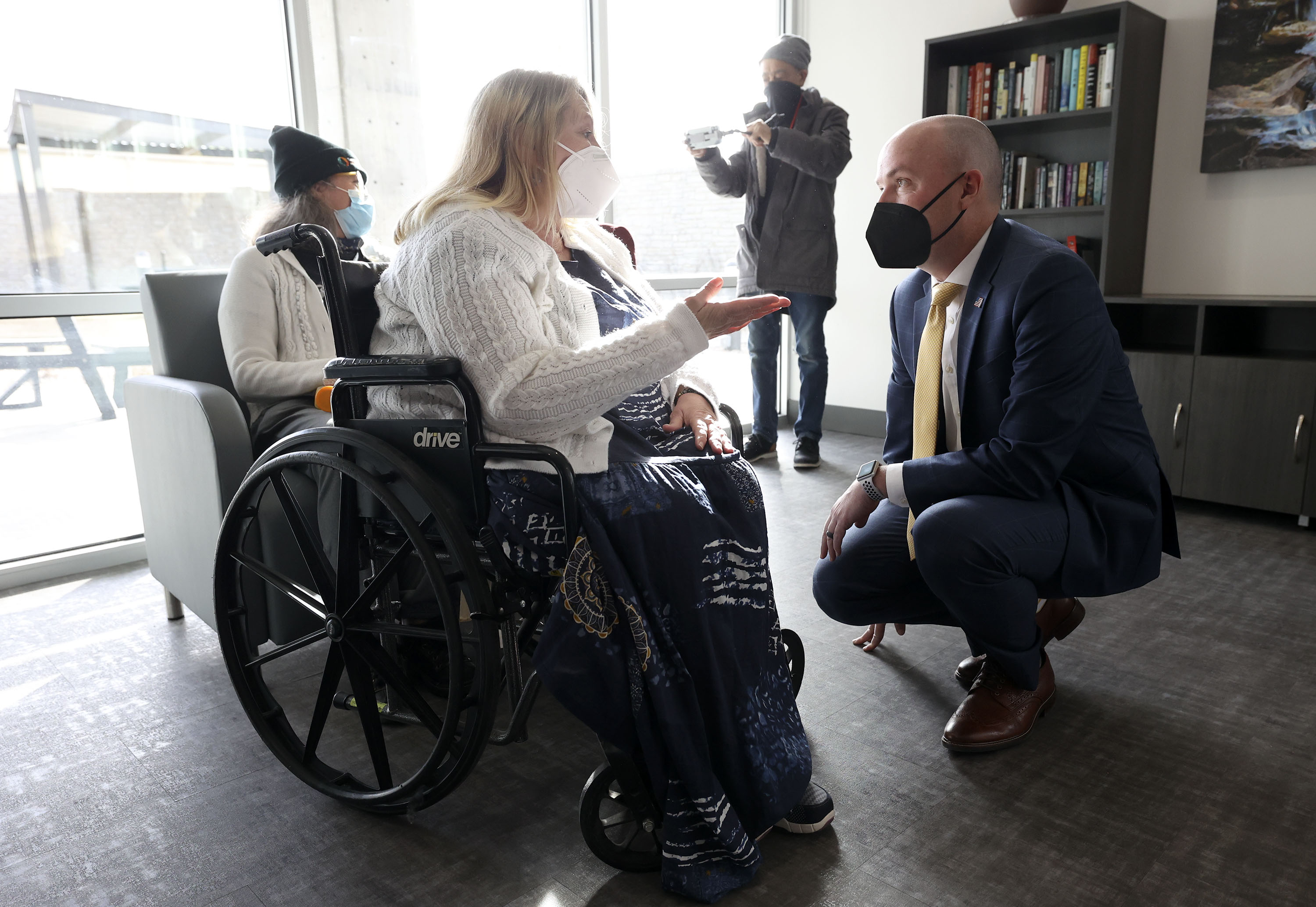 Alma Bennett, Pamela’s Place resident, talks to Gov. Spencer Cox at a press conference held to encourage Utahns to donate to the Pamela Atkinson Homeless Trust Fund at Pamela’s Place Apartments in Salt Lake City on Tuesday.