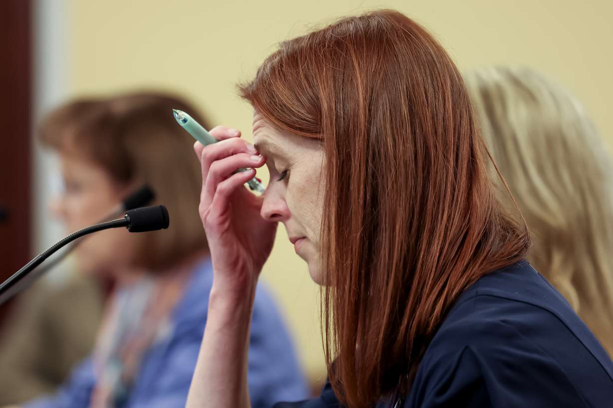House Assistant Minority Whip Jennifer Dailey-Provost, D-Salt Lake City, listens as Laura Bunker, co-founder of the Family Policy Resource, testifies against Dailey-Provost’s bill, HB74, in the House Health and Human Services Standing Committee at the Capitol in Salt Lake City on Tuesday. The bill, which would legalize certain patients with terminal illnesses to obtain a prescription for aid-in-dying, was defeated in committee.