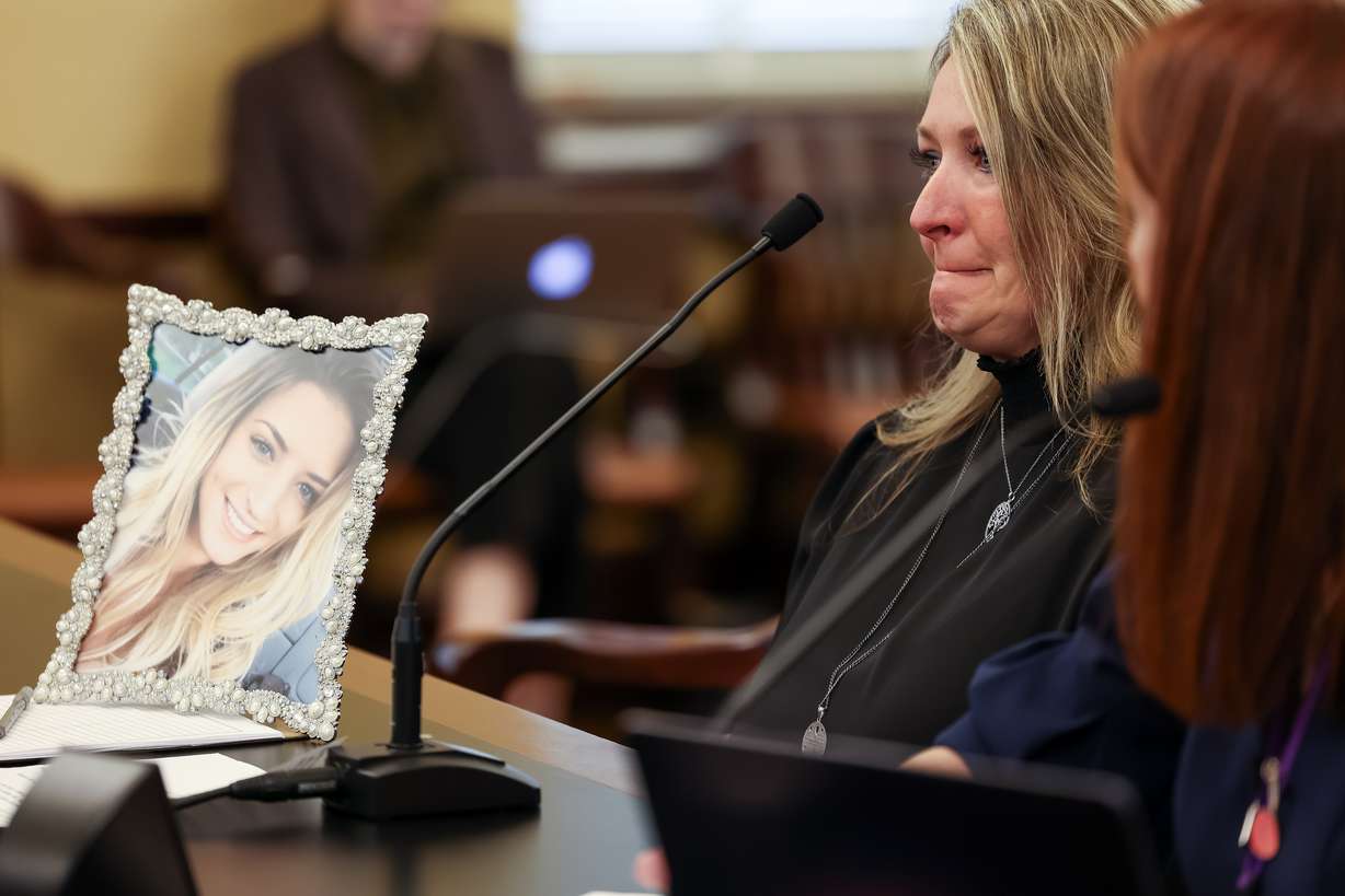 Tammy Allred testifies in favor of HB74 with a portrait of her daughter, Kylie Kaplanis, beside her in the House Health and Human Services Standing Committee at the Capitol in Salt Lake City on Tuesday. The bill, which would legalize certain patients with terminal illnesses to obtain a prescription for aid-in-dying, was defeated in committee. Kaplanis was diagnosed with ALS and died last month at age 27.