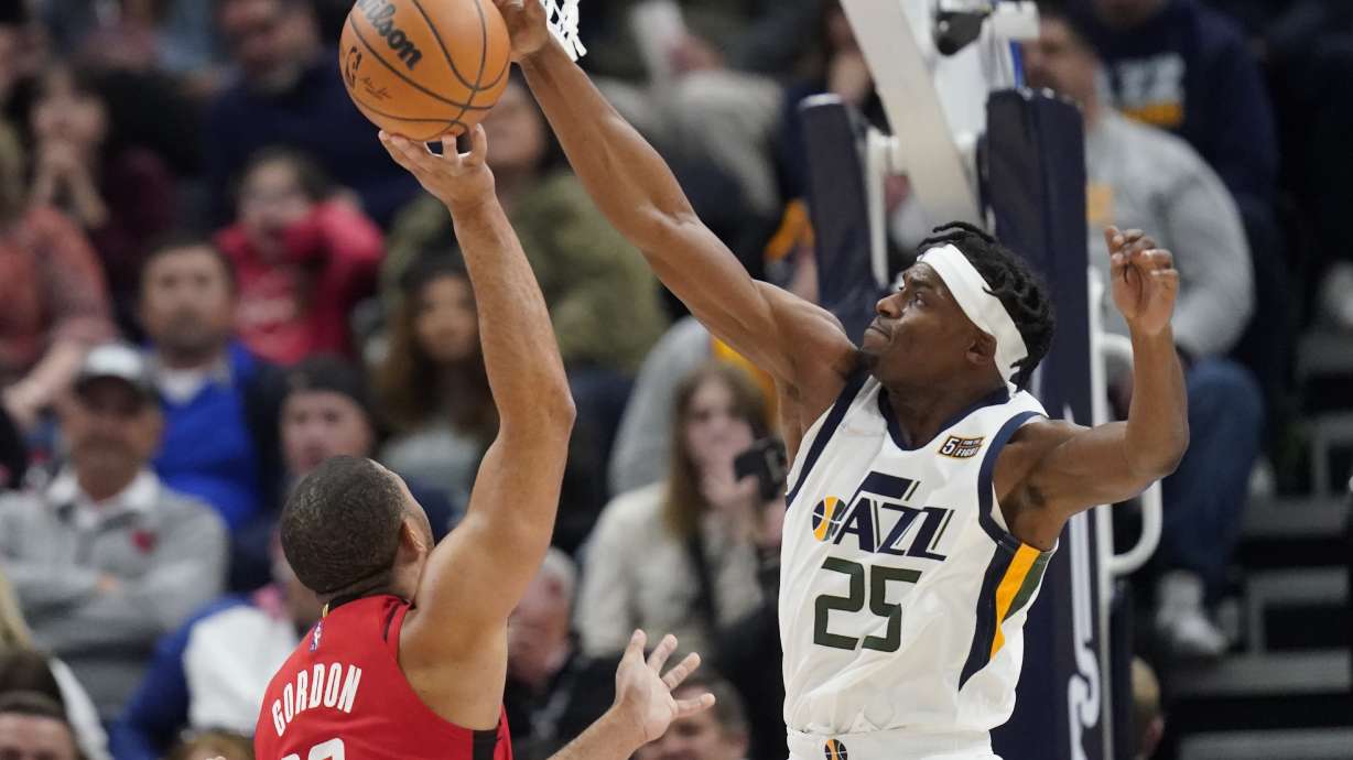 Utah Jazz Danuel House Jr. defends against Houston Rockets guard Eric Gordon (10) during the second half of an NBA basketball game Monday, Feb. 14, 2022, in Salt Lake City.