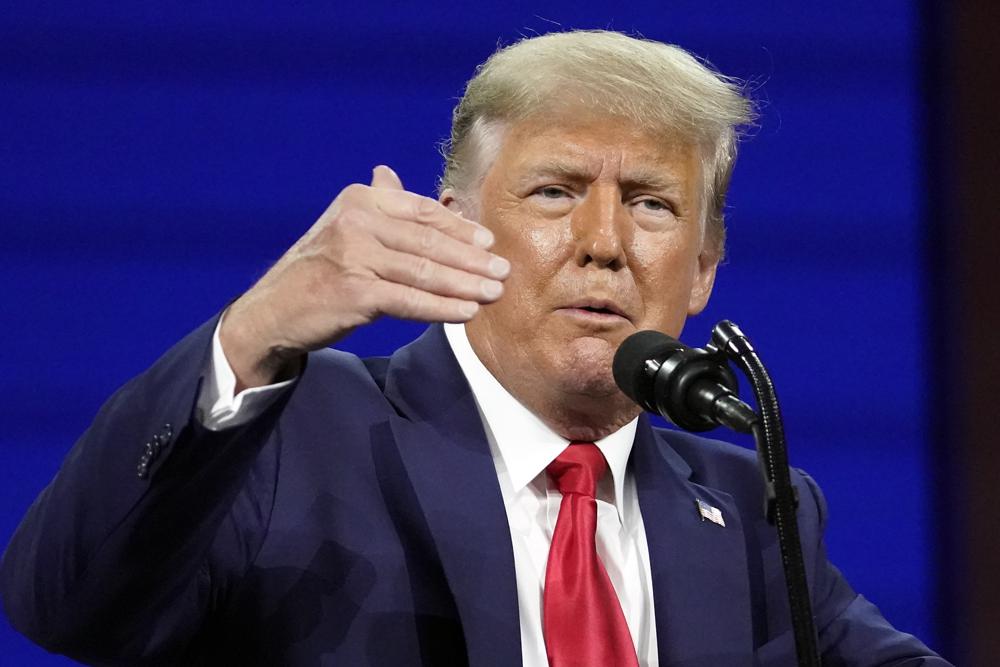 Former President Donald Trump speaks at the Conservative Political Action Conference, Feb. 28, 2021, in Orlando, Fla. A judge is hearing arguments Thursday in Trump's fight to avoid being questioned under oath in a New York investigation into his business practices. 