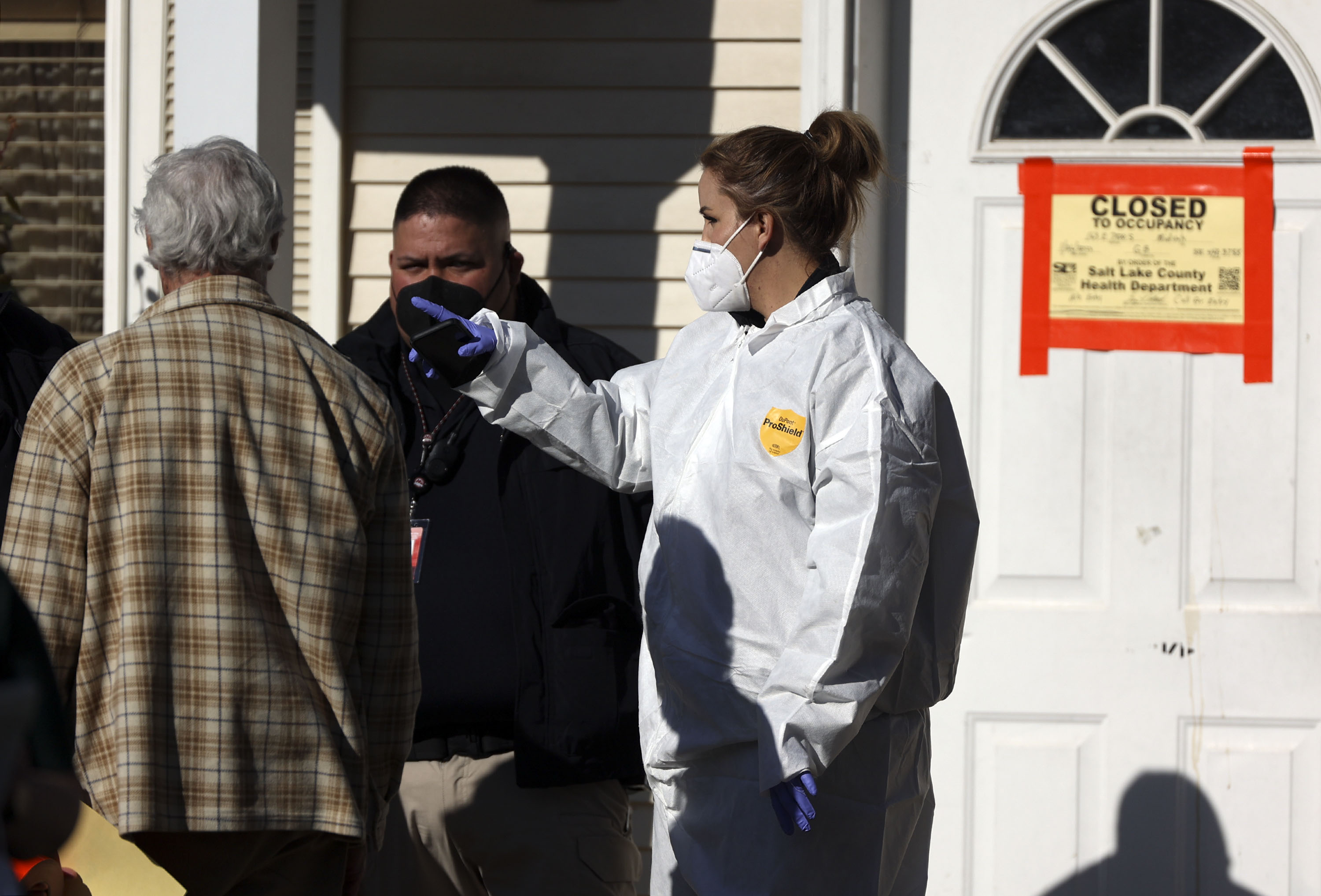 Unified Fire, Unified Police, Salt Lake County Sheriff and Salt Lake County Health Department officials respond to shut down Evergreen Place, an assisted living facility, due to health violations involving sewage backup and fire code violations in Midvale on Jan. 26.