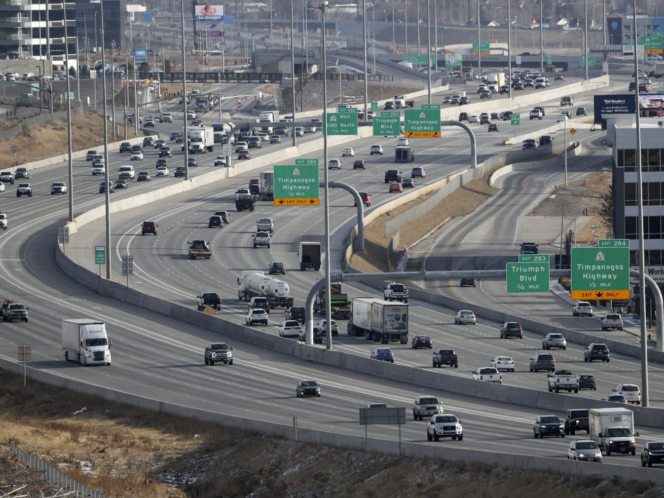 Traffic moves along I-15 in Lehi on Dec. 16, 2020. Lawmakers advanced legislation Thursday to designate a way to merge on Utah roads, allow pets to be included in protective orders, change the fee structure for government records requests and give the state oversight of major transit projects.