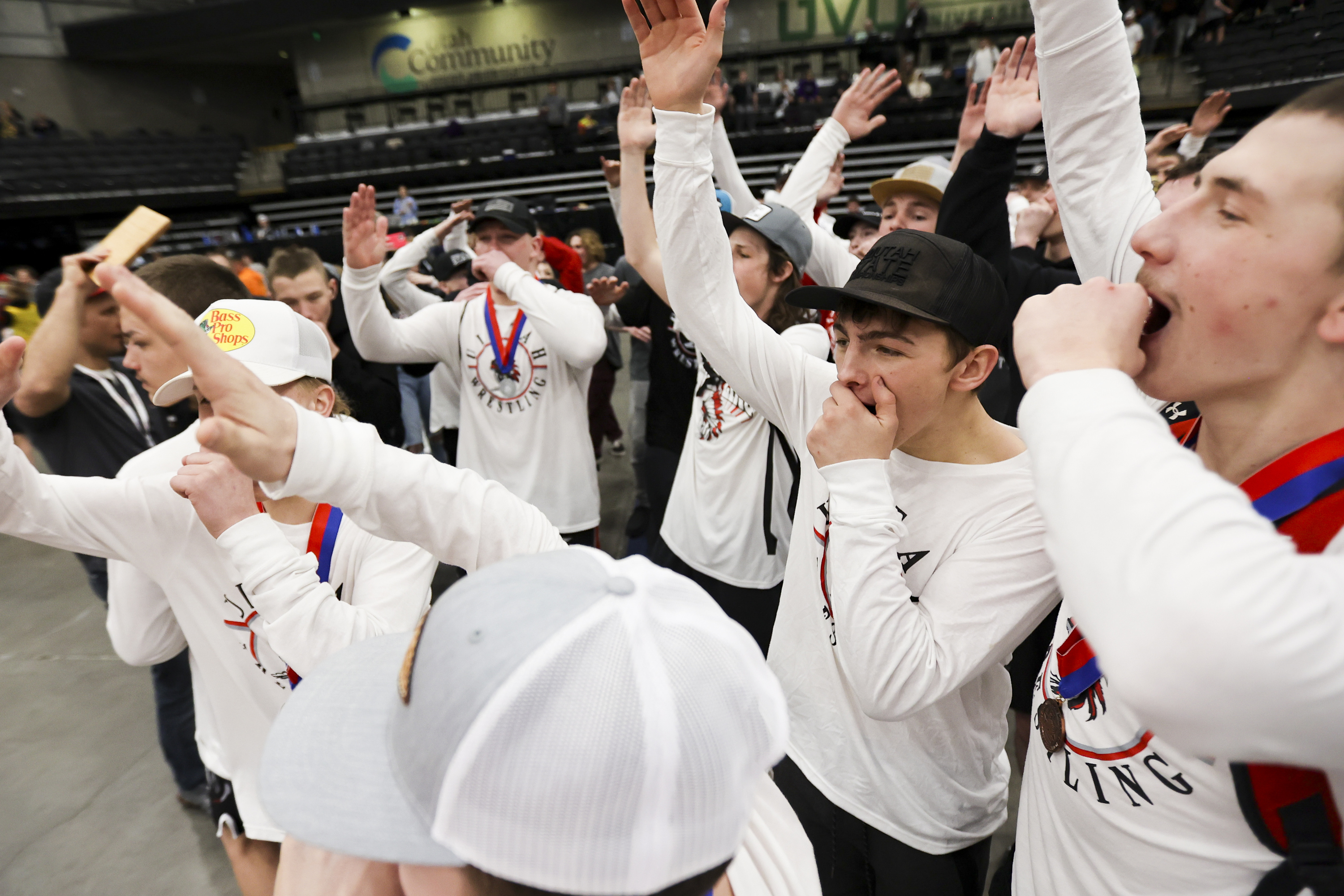 Uintah boys wrestling team celebrates after winning he 5A wrestling state championship at UCCU Center in Orem on Thursday, Feb. 17, 2022.