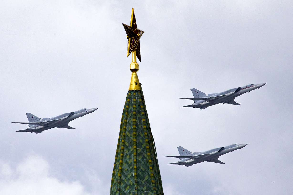 Russian Tu-22M3 bombers fly over the Kremlin's Tower with a Red Star on the top May 5, 2016. Russia is planning massive drills of its strategic military forces that provide a stark reminder of the country's nuclear might.