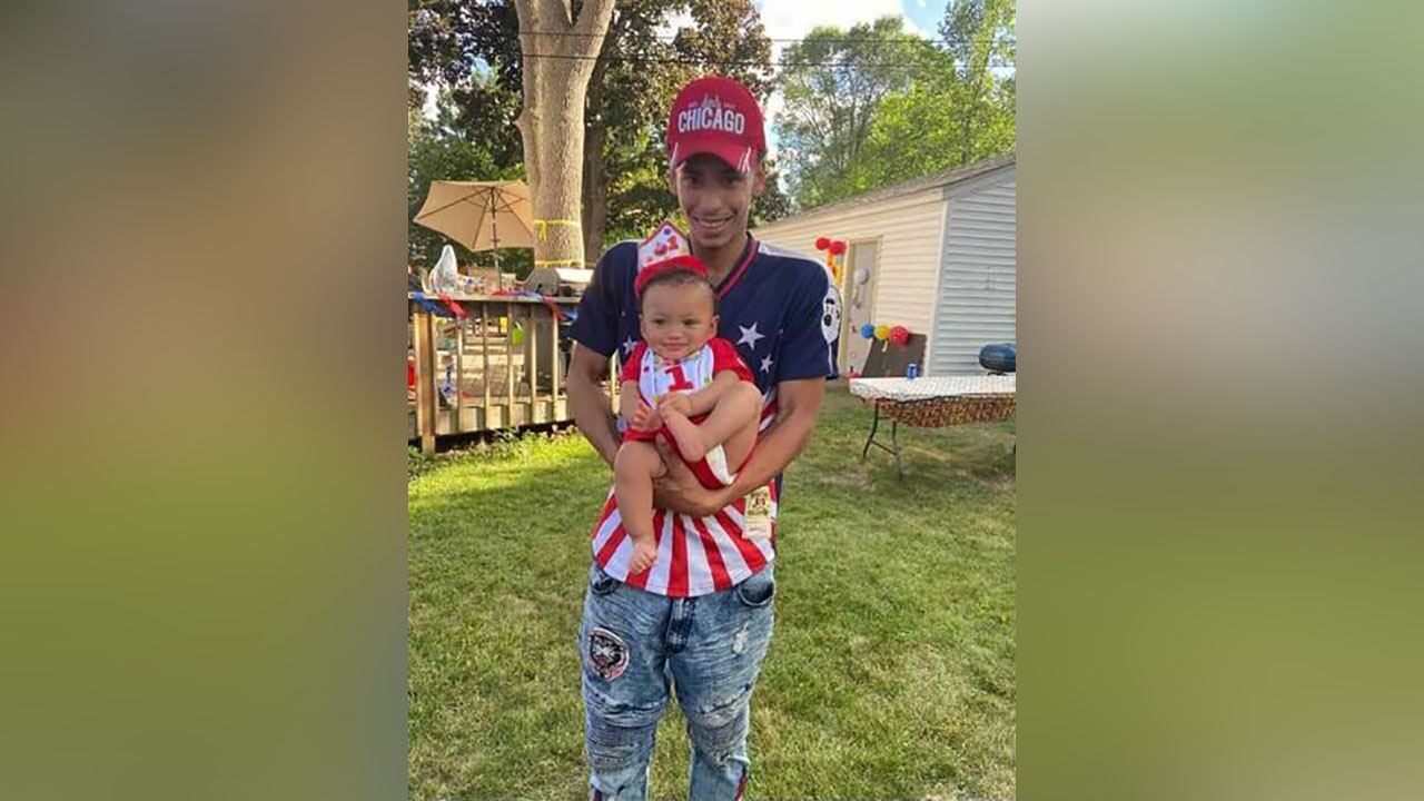 Daunte Wright and his son, Daunte Jr., at the child's first birthday party. Kim Potter, the former suburban Minneapolis police officer who said she confused her handgun for her Taser when she killed Daunte Wright, is expected to be sentenced on Friday.