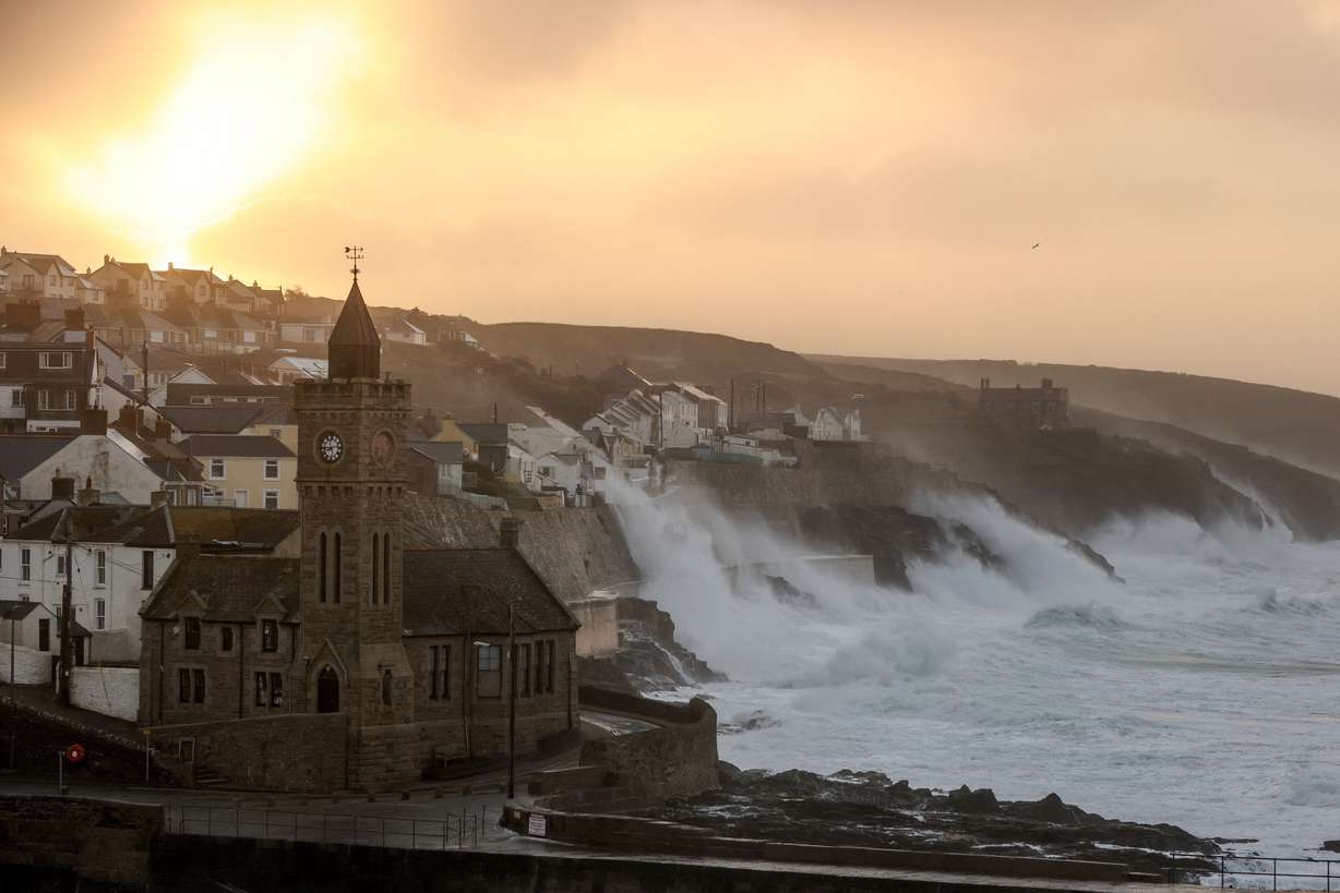 Large waves and strong winds hit during Storm Eunice, in Porthleven, Cornwall, Britain, Friday.