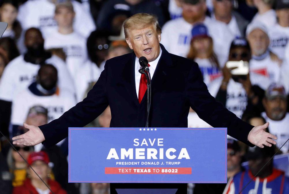 Former President Donald Trump speaks at a rally, Jan. 29, in Conroe, Texas. Fifteen boxes of White House records stored at former President Donald Trump’s Mar-a-Lago residence contained items marked as classified national security information, the National Archives said Friday.