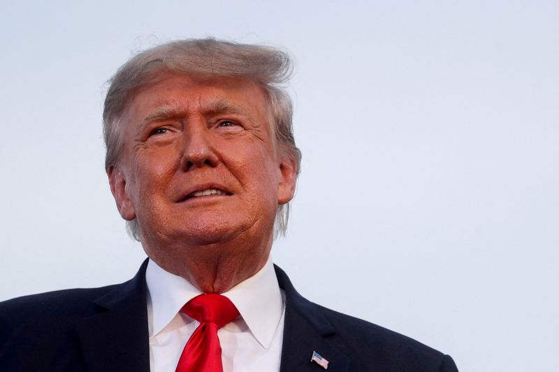 Former U.S. President Donald Trump looks on during his first post-presidency campaign rally at the Lorain County Fairgrounds in Wellington, Ohio, on June 26, 2021. Friday a judge denied a Trump request to toss out Jan. 6 incitement lawsuits.