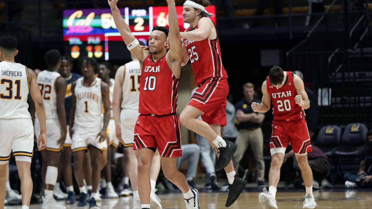 Utah guard Marco Anthony (10) celebrates with guard Rollie Worster (25) and guard Lazar Stefanovic (20) after Utah defeated California in an NCAA college basketball game in Berkeley, Calif., Saturday, Feb. 19, 2022.