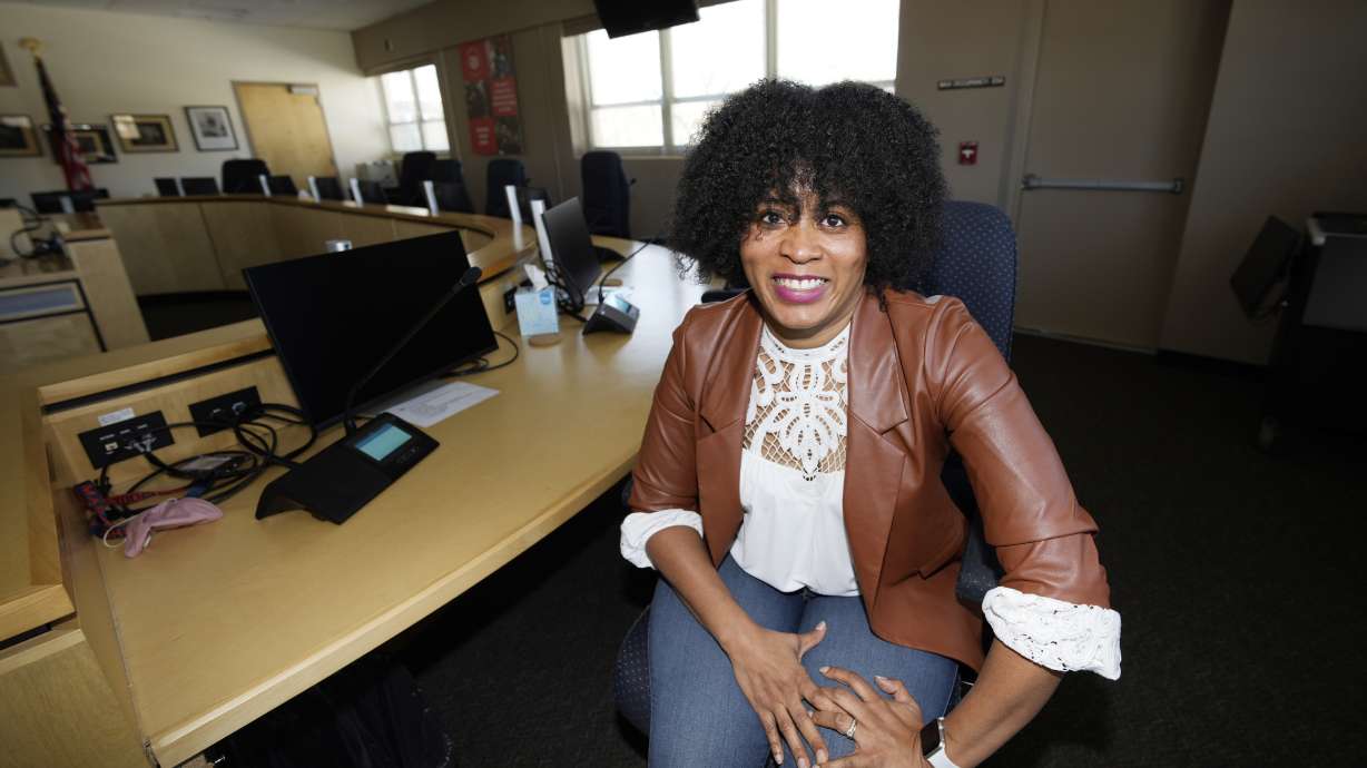 Alexis Knox-Miller, equity director for the Colorado Springs, Colo., school system, poses on Feb. 4 in the boardroom in the district's main office in Colorado Springs, Colo.