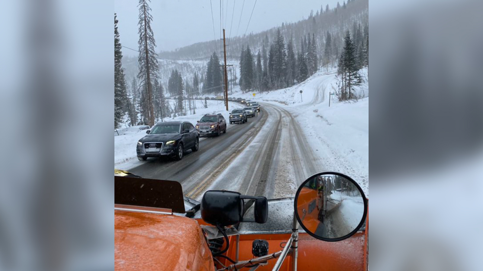 A snowplow clears state Route 190 near Brighton Resort in Big Cottonwood Canyon Monday morning. The National Weather Service said snowfall is expected through much of the state Monday.