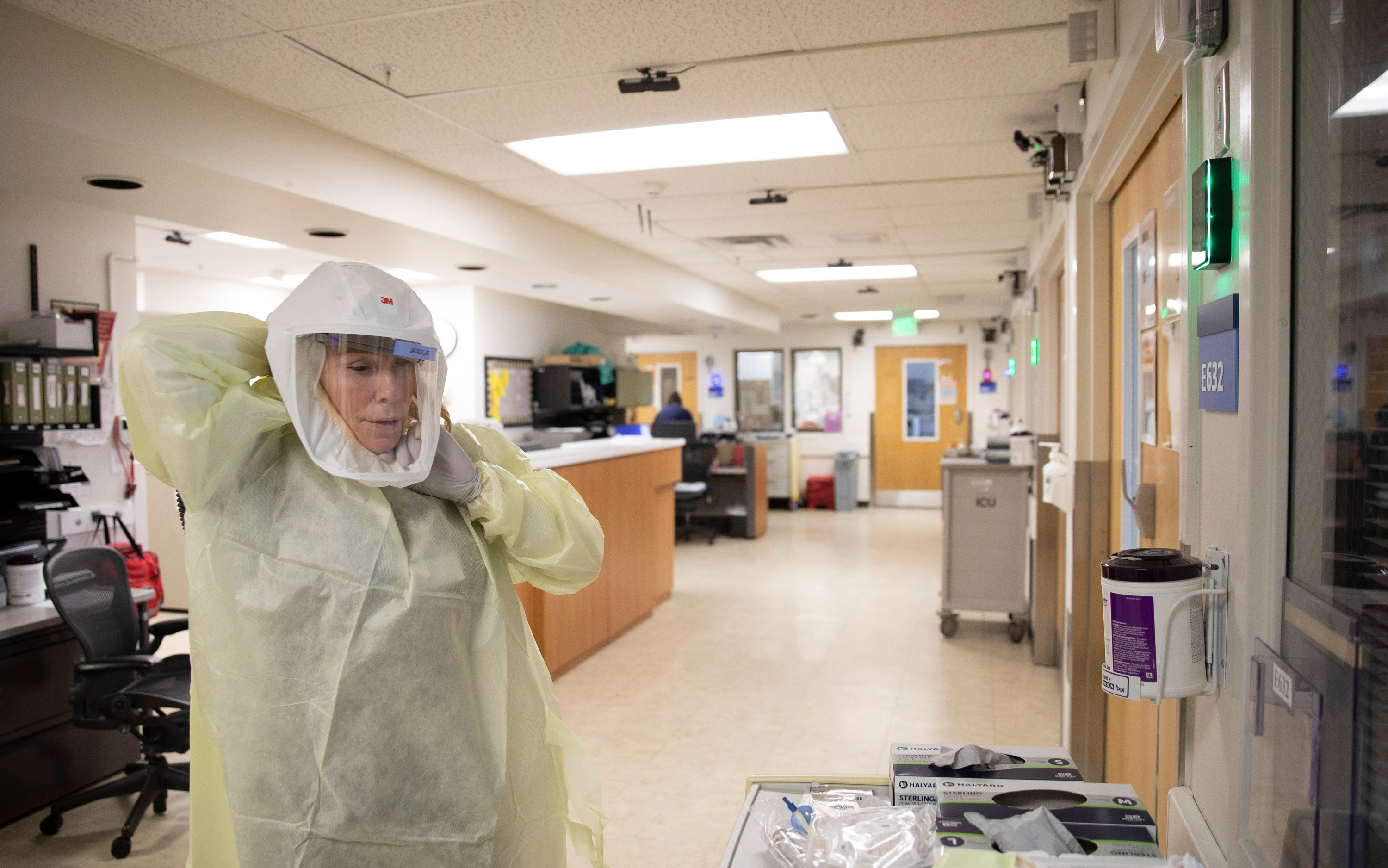 Medical personnel work at LDS Hospital’s COVID-19 unit in Salt Lake City on Feb. 3. New cases are decreasing, but COVID-19 is still out there and the likelihood of contracting it depends on individual risk and local transmission levels, Utah doctors said Tuesday, adding that vaccines are still key.