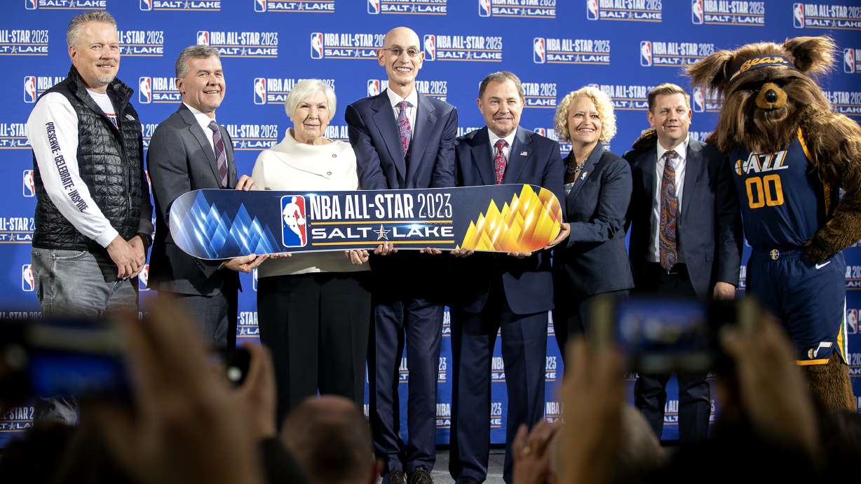 Greg Miller, Jim Olson, Larry H. Miller Sports and Entertainment, Utah Jazz owner Gail Miller, NBA commissioner Adam Silver, Utah Gov. Gary R. Herbert, Salt Lake City Mayor Jackie Biskupski, Larry H. Miller companies CEO Steve Starks, and Bear pose for photos following the announcement that the 2023 NBA All-Star game will be held at Vivint Smart Home Arena in Salt Lake City on Wednesday, Oct. 23, 2019.