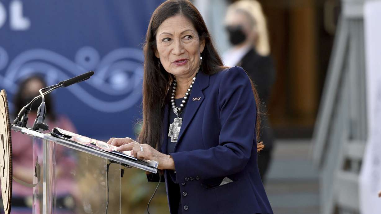 Interior Secretary Deb Haaland speaks at the Cherokee Immersion School Friday, Dec. 3, 2021, in Tahlequah, Okla. Federal officials have come up with a list of potential replacement names for hundreds of geographic features in three dozen states that include the word "squaw." The list was announced Tuesday.