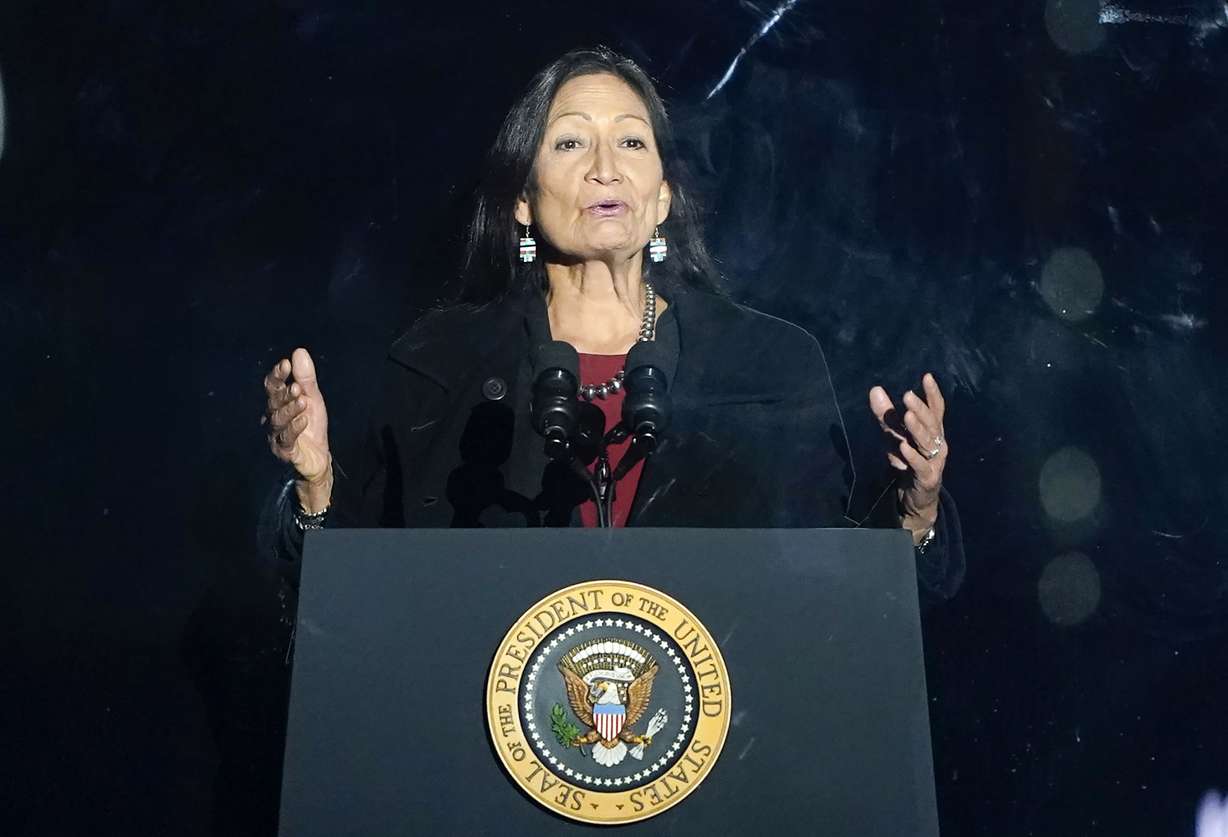Interior Secretary Deb Haaland speaks at the Ellipse near the White House, Thursday, Dec. 2, 2021, in Washington. Federal officials have come up with a list of potential replacement names for hundreds of geographic features in three dozen states that include the word "squaw." The list was announced Tuesday, Feb. 22, 2022.