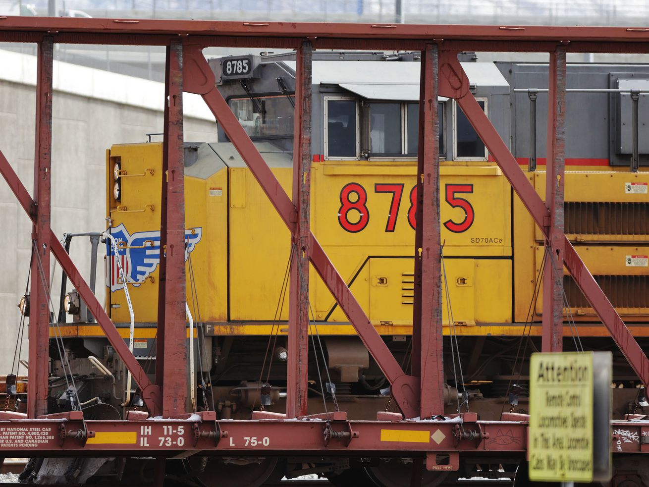An engine pulls cars at the Union Pacific Roper yard in South Salt Lake on Tuesday.