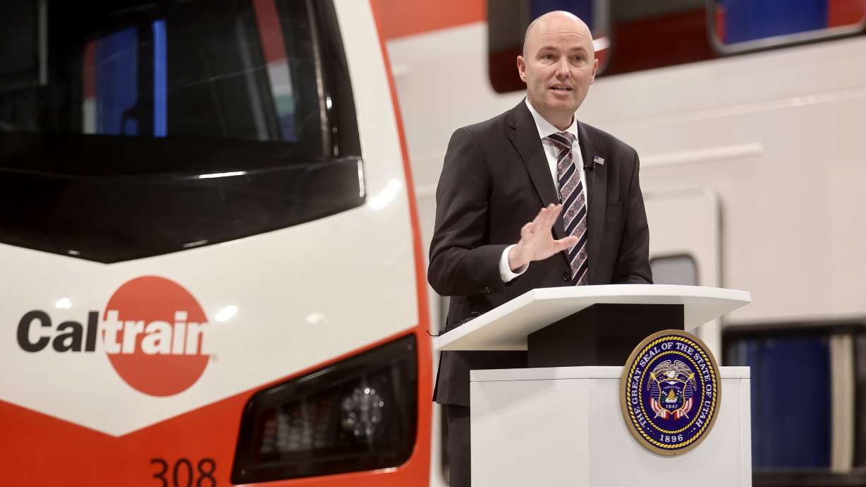 Utah Gov. Spencer Cox speaks about the Adopt-A-School initiative in Salt Lake City Wednesday. The program invites employers to support K-12 students in Utah in a unique partnership.