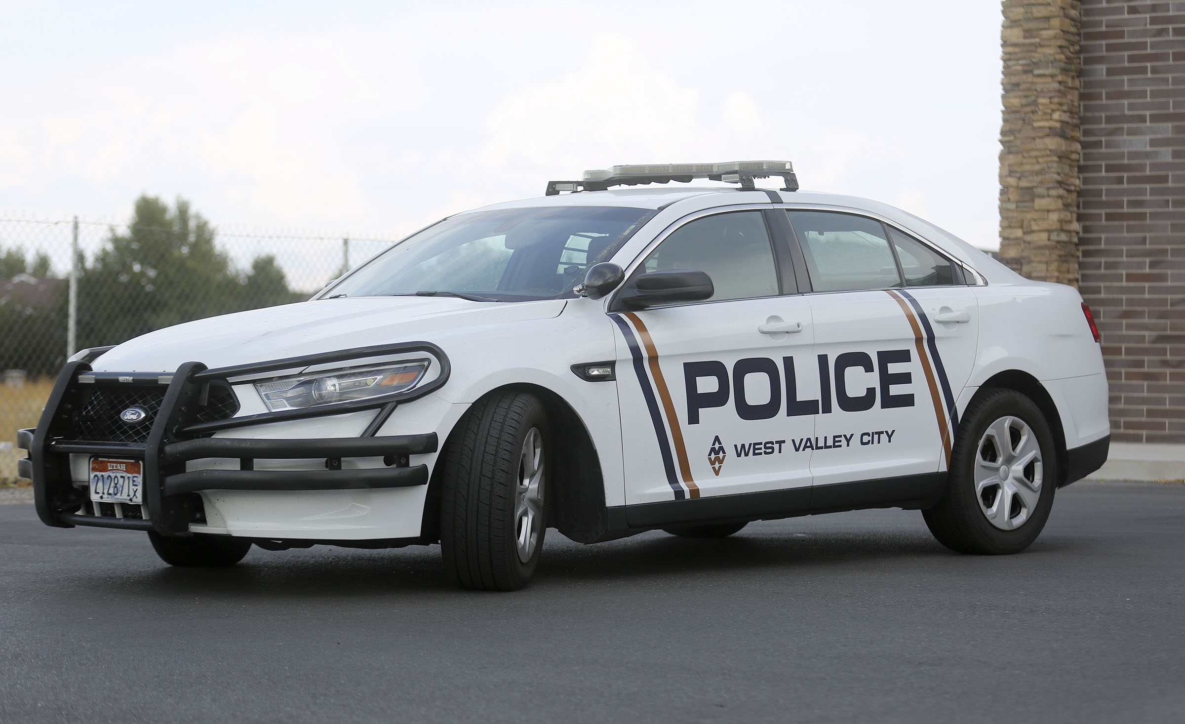 A 18-year-old woman was shot while driving in her car in the early morning on Sunday in West Valley City by people standing by the street, police said.