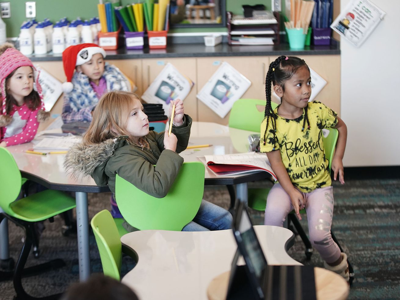 First graders at South Clearfield Elementary in
Clearfield listen to teacher Tiffany Hatch during class on Dec. 15,
2021. According to a new Deseret News/Hinckley Institute of
Politics poll most Utahns wants this year’s extra revenue go toward
education.