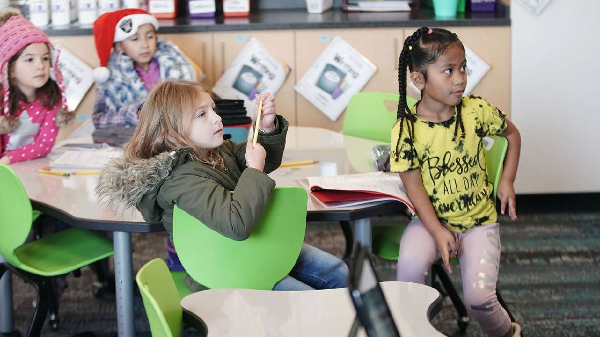 First graders at South Clearfield Elementary in
Clearfield listen to teacher Tiffany Hatch during class on Dec. 15,
2021. According to a new Deseret News/Hinckley Institute of
Politics poll most Utahns wants this year’s extra revenue go toward
education.