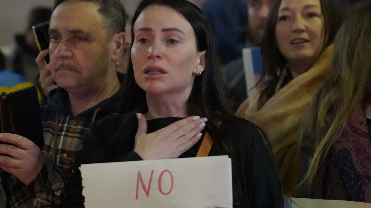 People protest the Russian invasion of Ukraine at a demonstration in the Studio City neighborhood of Los Angeles, Thursday.
