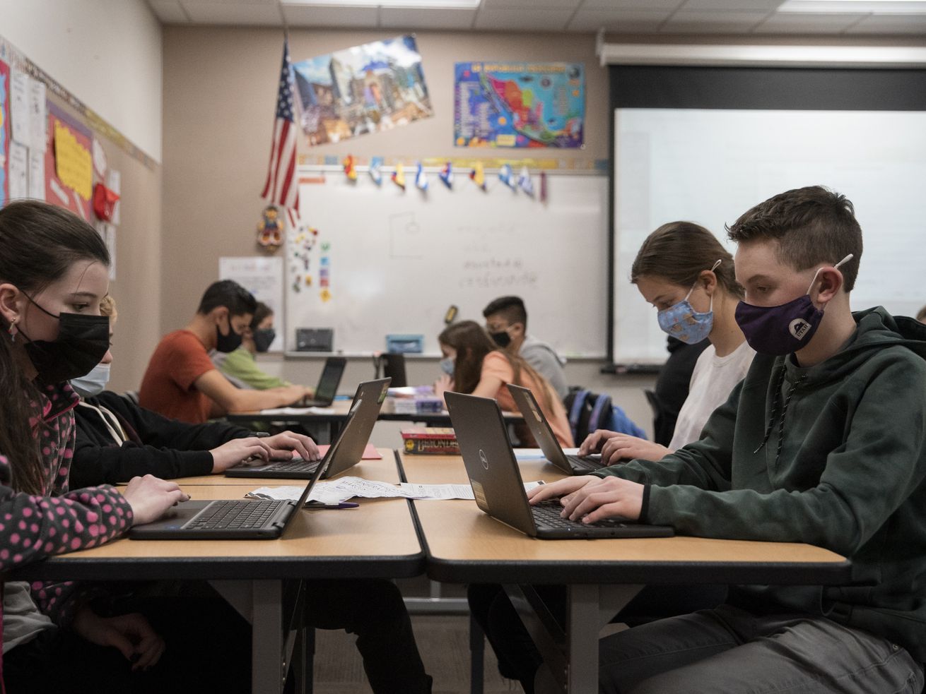 Eighth grade students at Mount Jordan Middle School in Sandy work in their dual language class on Jan. 10. A new poll says Utahns wants local school boards to have the primary role in approving curriculum in K-12 schools.
