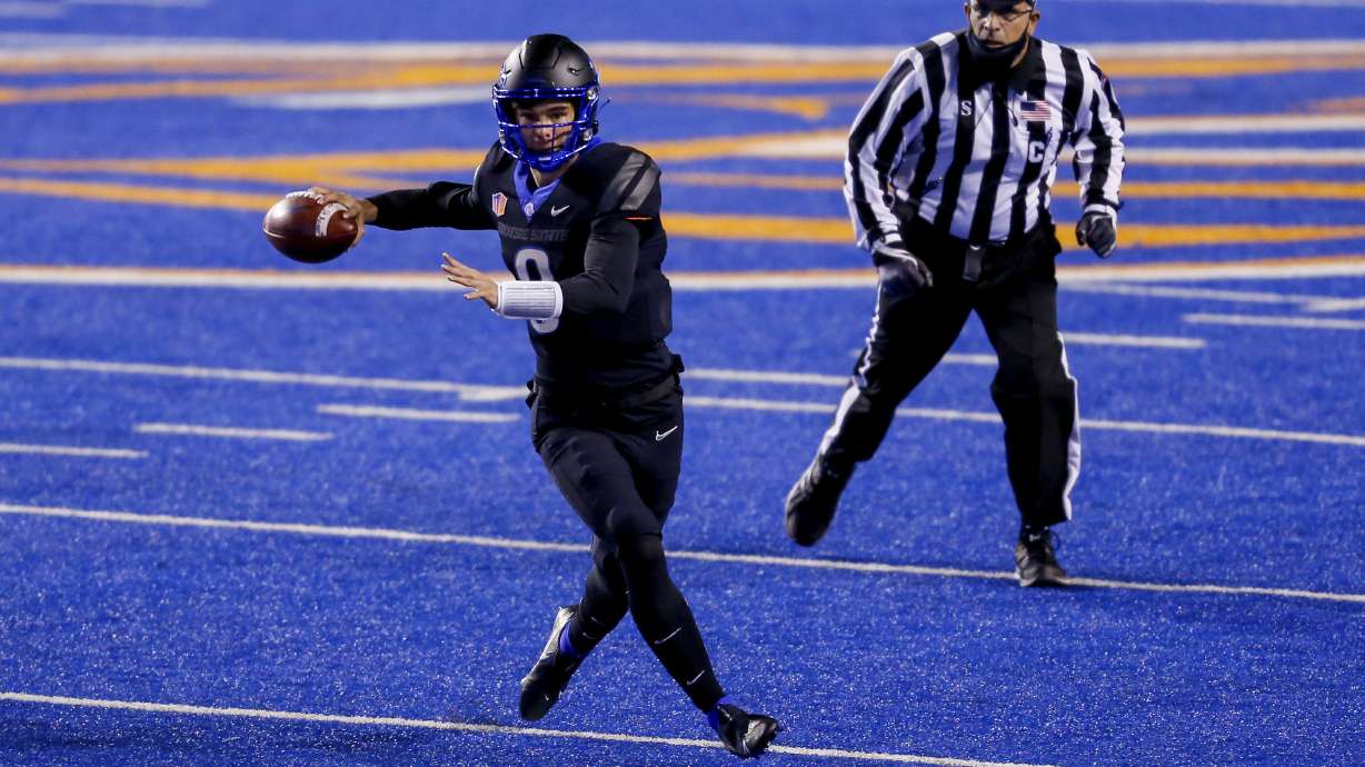 Boise State quarterback Cade Fennegan prepares to throw the ball against BYU in an NCAA college football game on Nov. 6, 2020, in Boise.