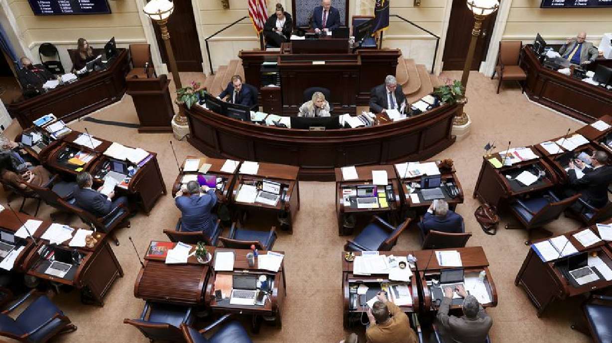 Lawmakers work in the Senate chamber at the Capitol in
Salt Lake City on Friday. A bill to study the use of psychedelic drugs — sometimes called “magic mushrooms” — to treat mental illness has now passed both chambers of the Legislature and awaits action from Gov. Spencer Cox.
