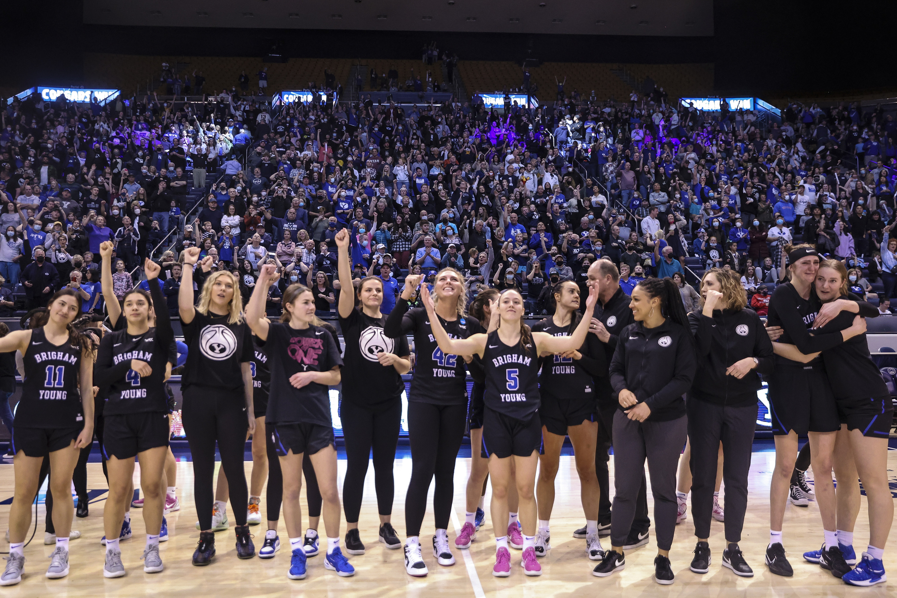 The BYU Cougars celebrate after winning a West Coast Conference game against the Gonzaga Bulldogs at the Marriott Center in Provo on Saturday, Feb. 19, 2022.