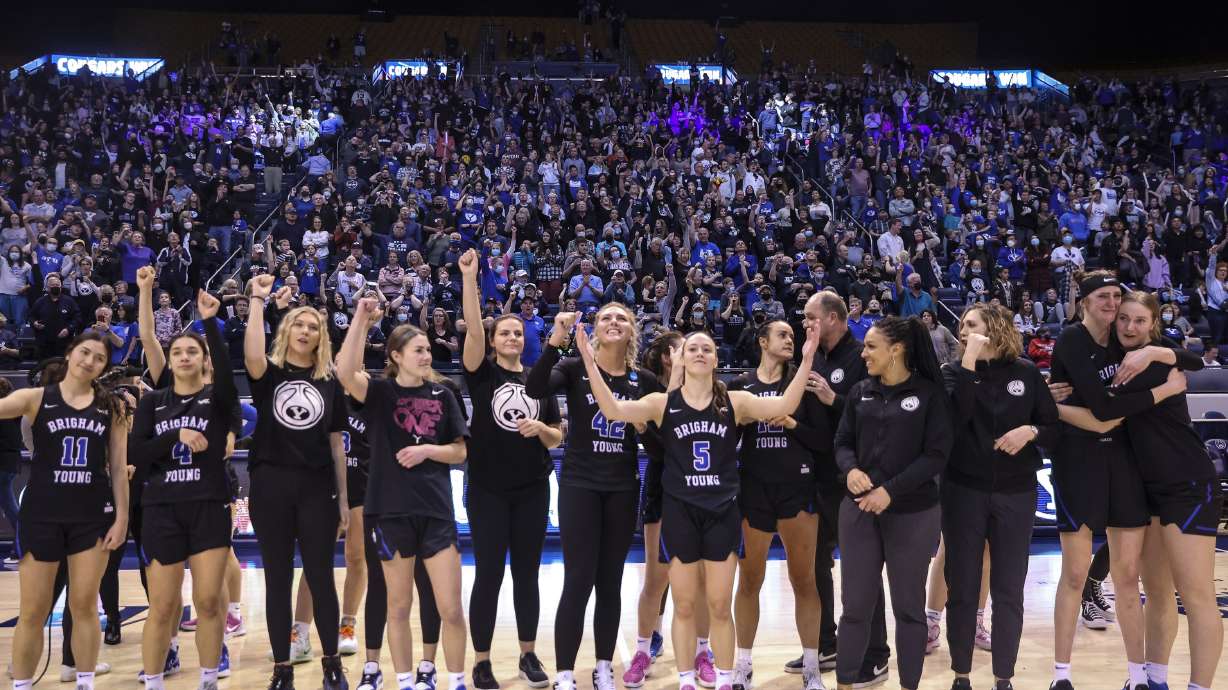 The BYU Cougars celebrate after winning a West Coast Conference game against the Gonzaga Bulldogs at the Marriott Center in Provo on Saturday, Feb. 19, 2022.