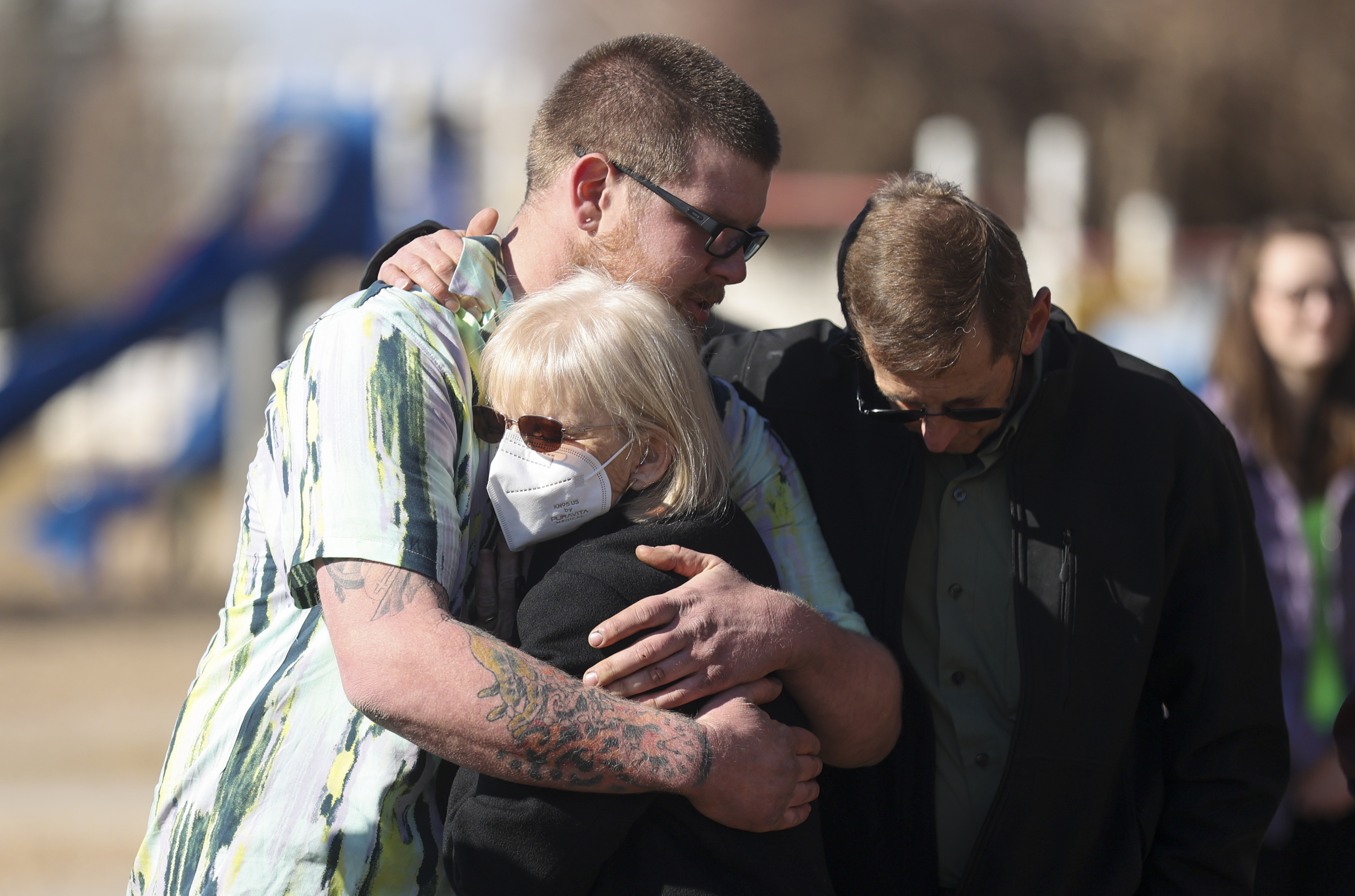 Dozens of people gather at a vigil to in memory Greg Workman, who died in a wrong-way accident on Sunday, at Hatch Park in North Salt Lake on Saturday.