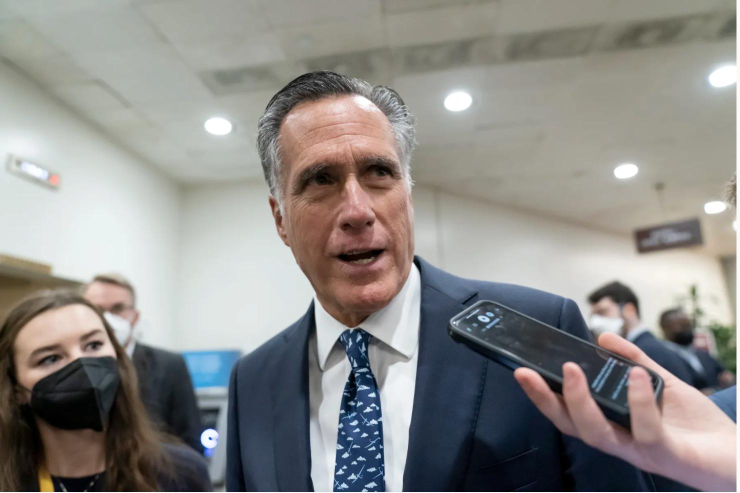 Sen. Mitt Romney, seen in this Feb. 15 photo, called Ukrainian President Volodymyr Zelenskyy a "world hero" on Sunday for his efforts to defend his country, denounced Vladimir Putin as "small, feral-eyed" man and referred to fellow Republicans who attended a conference where the Russian leader was cheered as "morons."
.