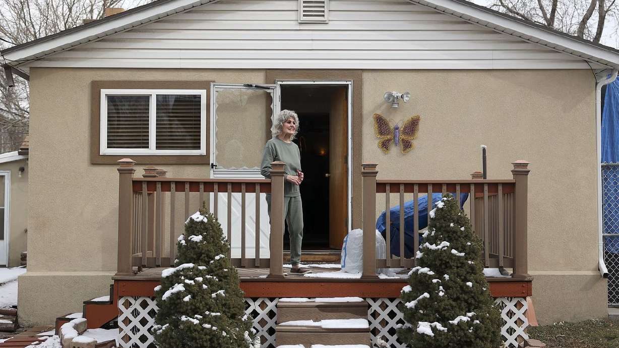 Cheryl Johnson looks out at her backyard in South Salt Lake on Thursday. Johnson is grateful for the Circuit Breaker property tax relief program, which helps her stay in her home as property taxes rise.
