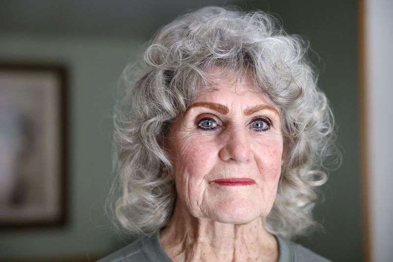 Cheryl Johnson poses for a portrait at her home, which
she has lived in for nearly 60 years, in South Salt Lake on
Thursday. Johnson is grateful for the Circuit
Breaker property tax relief program, which helps her stay in her
home as property taxes rise.