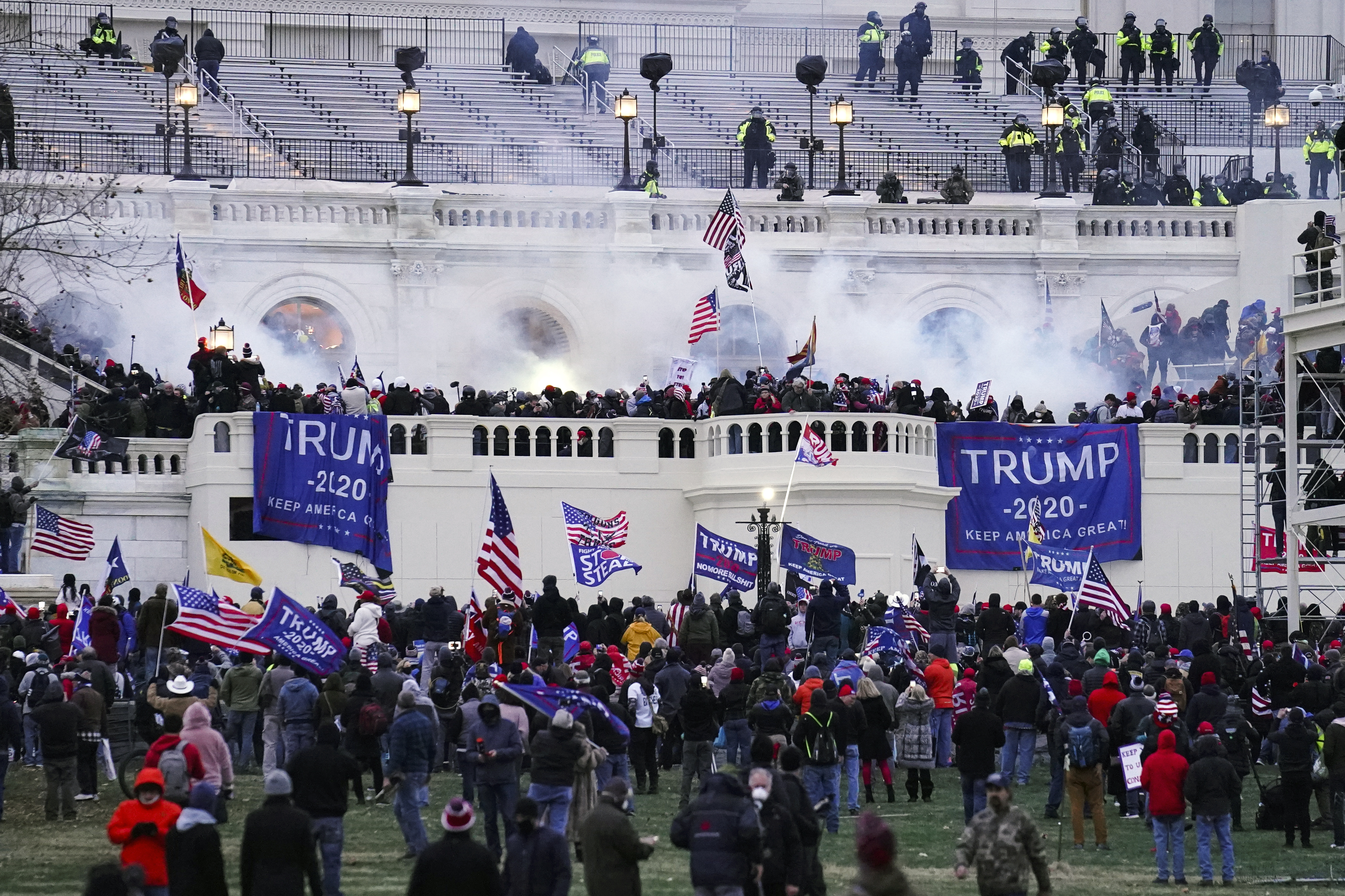 Insurrectionists storm the Capitol in Washington on Jan. 6, 2021. The first trial for one of the hundreds of Capitol riot prosecutions starts this week, with jury selection scheduled to begin on Monday.