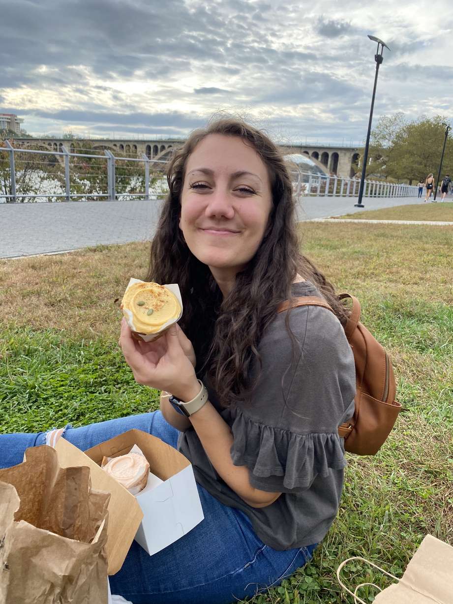 Eating disorder recovery advocate Christine Parks eats a pumpkin cupcake in Washington, D.C.