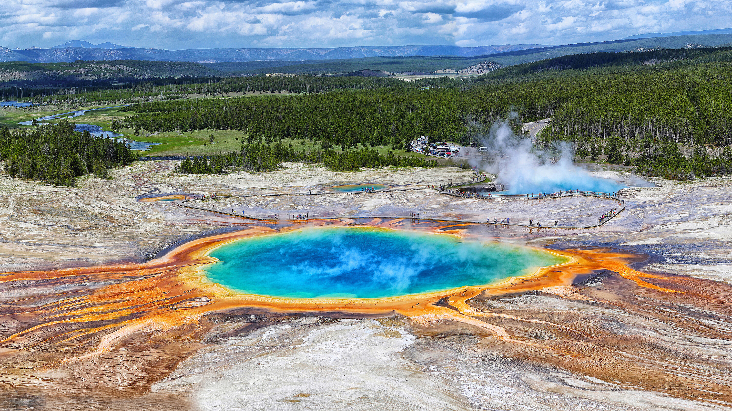 Grand Prismatic Spring is an otherwordly sight at Yellowstone National Park. The park — 96% of which is in Wyoming, 3% in Montana and 1% in Idaho — is celebrating a major milestone this year.